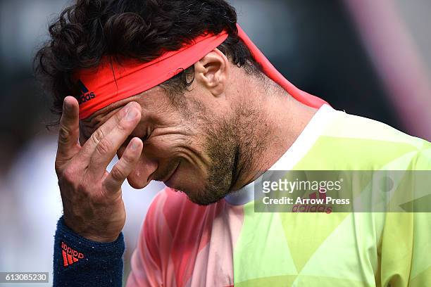 Juan Monaco of Argentina reacts after losing the men's singles quarterfinal match against Marin Cilic of Croatia on day five of Rakuten Open 2016 at...