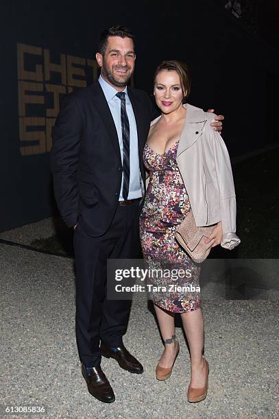 David Bugliari and Alyssa Milano attend a benefit hosted by Brian Grazer for the Ghetto Film School on October 6, 2016 in Beverly Hills, California.