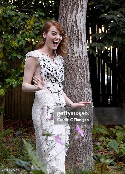 Actress Emma Stone arrives to the opening night and special screenings reception for the films 'La La Land' and 'Arrival' during the 39th Mill Valley...