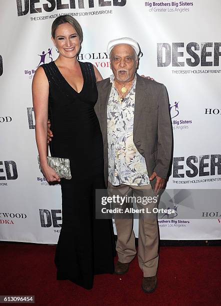 Director Ashley Avis and actor Gerry Bednob arrive for the Premiere Of Winterstone Pictures' "Deserted" held at Majestic Crest Theatre on October 6,...