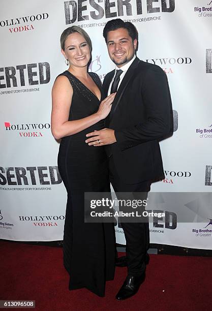 Director Ashley Avis and Edward Winters arrive for the Premiere Of Winterstone Pictures' "Deserted" held at Majestic Crest Theatre on October 6, 2016...