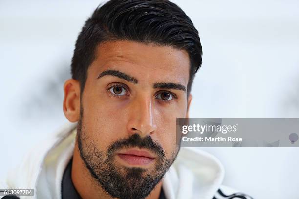 Sami Khedira of Germany talks during a press conference ahead of the FIFA 2018 World Cup Group C Qualifier match against Czech Republic at Mercedes...