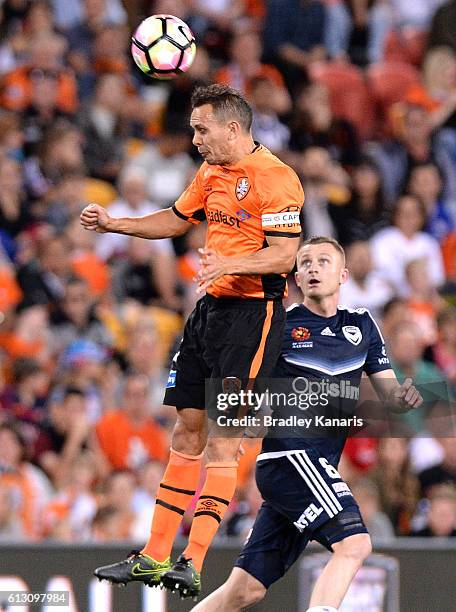 Jade North of the Roar heads the ball during the round one A-League match between the Brisbane Roar and Melbourne Victory at Suncorp Stadium on...