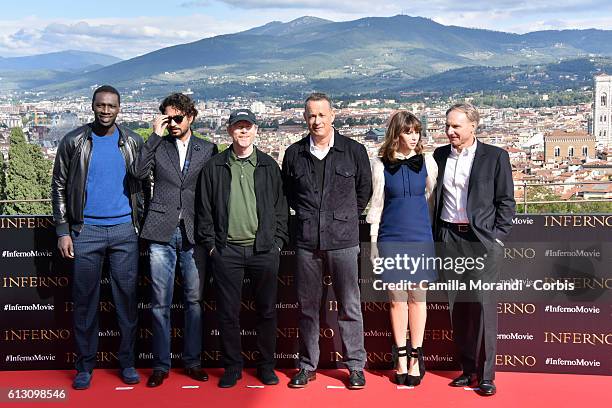 Omar Sy, Irrfan Khan, Ron Howard, Tom Hanks, Felicity Jones and Dan Brown attend a photocall for 'Inferno' on October 7, 2016 in Florence, Italy.