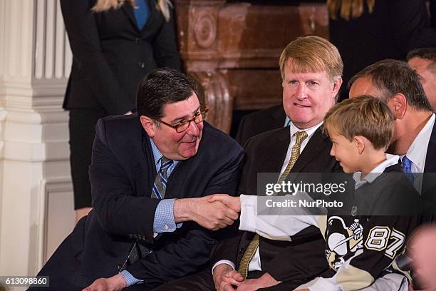 On Thursday, Oct. 6, in the East Room of the White House, Bill Peduto , the Mayor of Pittsburgh, shakes a young Penguins' fan's hand.