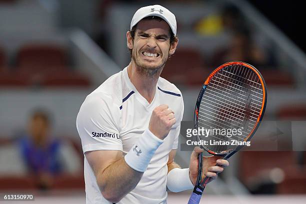 Andy Murray of Great Britain celebrates a point against Kyle Edmund of Great Britain during the Men's Singles Quarterfinals match on day seven of the...