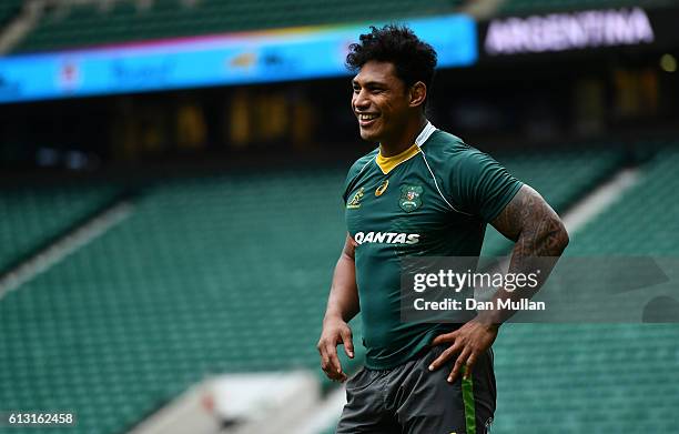 Lopeti Timani of Australia smiles during the Australia Captain's Run ahead of the Rugby Championship match against Argentina at Twickenham Stadium on...