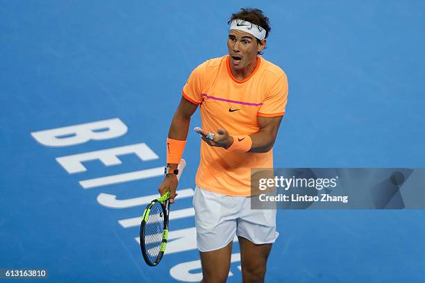 Rafael Nadal of Spain reacts after losing the point against Grigor Dimitrov of Bulgaria during the Men's Singles Quarterfinals match on day seven of...