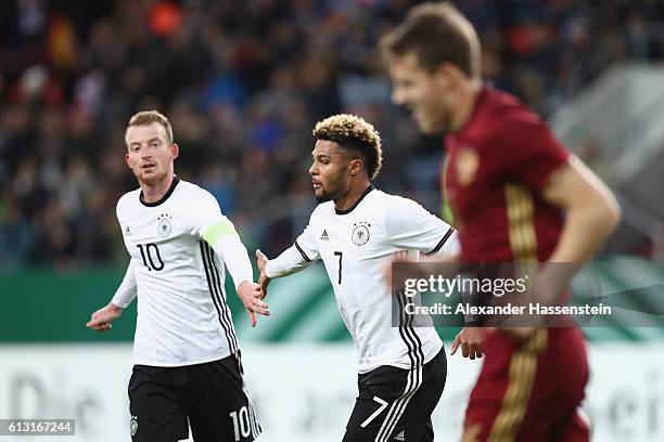 Serge Gnabry of Germany celebrates scoring the 2nd team goal with his team mate Maximilian Arnold during the 2017 UEFA European U21 Championships...