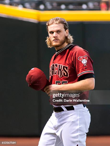 Matt Koch of the Arizona Diamondbacks warms up before the MLB game between the San Diego Padres and Arizona Diamondbacks at Chase Field on October 2,...