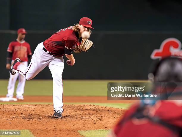 Matt Koch of the Arizona Diamondbacks warms up in the third inning of the MLB game against the San Diego Padres at Chase Field on October 2, 2016 in...