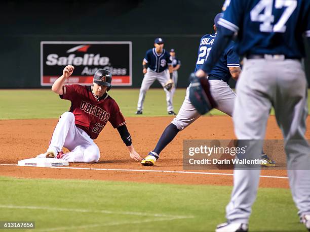 Brandon Drury of the Arizona Diamondbacks slides safely into third base on a single by Yasmany Tomas in the second inning of the MLB game against the...