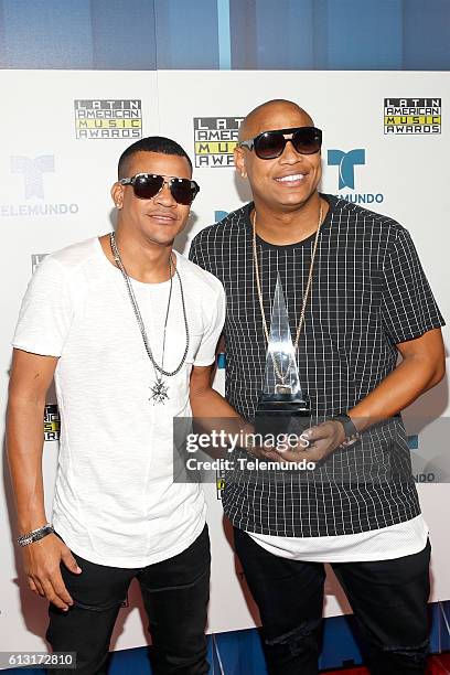 Press Room" -- Pictured: Recording artists Randy Malcom Martinez and Alexander Delgado of music group Gente De Zona pose with an award backstage at...