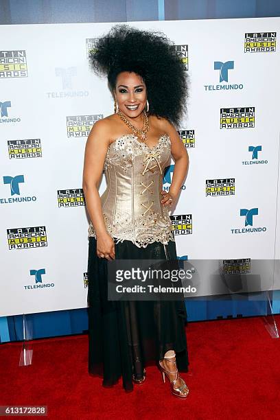 Press Room" -- Pictured: Recording artist Aymee Nuviola poses backstage at the 2016 Latin American Music Awards at the Dolby Theater in Los Angeles,...