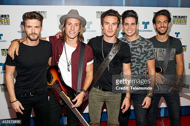 Press Room" -- Pictured: Music group DVICIO poses backstage at the 2016 Latin American Music Awards at the Dolby Theater in Los Angeles, CA on...