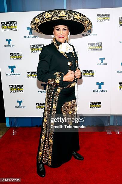Press Room" -- Pictured: Recording artist Aida Cuevas poses backstage at the 2016 Latin American Music Awards at the Dolby Theater in Los Angeles, CA...