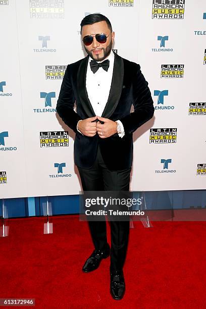 Press Room" -- Pictured: Recording artist Alex Sensation poses backstage at the 2016 Latin American Music Awards at the Dolby Theater in Los Angeles,...