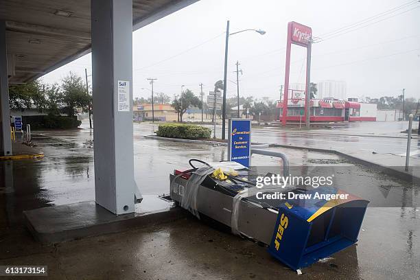 Pump station at a gas station sits on the ground after Hurricane Matthew passed through on October 7, 2016 in Daytona Beach, Florida. Florida,...