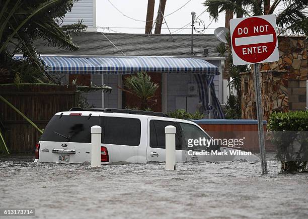 Car is sumerged in Hurricane Matthew's flood waters, October 7, 2016 on Port Orange, Florida. Hurricane Matthew passed by offshore as a catagory 3...