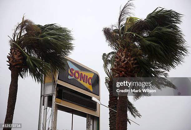 Restaurant sign was damaged by the heavy winds of Hurricane Matthew, October 7, 2016 on Port Orange, Florida. Hurricane Matthew passed by offshore as...