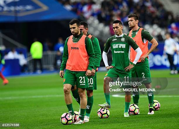 Bulgaria's midfielder Svetoslay Dyakov, Bulgaria's midfielder Shivko Milanov, Bulgaria's midfielder Marcelinho and Bulgaria's defender Strahil Popov...