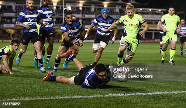 Matt Banahan of Bath stretches to score the first try during the Aviva Premiership match between Bath Rugby and Sale Sharks at the Recreation Ground...