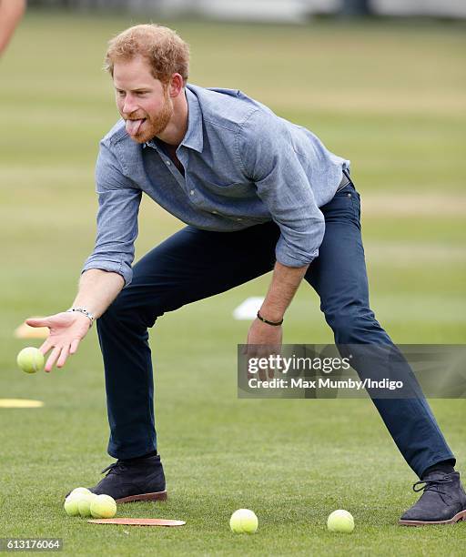 Prince Harry takes part in a training session as he attends an event to mark the expansion of the Coach Core sports coaching apprenticeship programme...