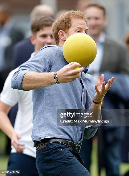 Prince Harry takes part in a training session as he attends an event to mark the expansion of the Coach Core sports coaching apprenticeship programme...