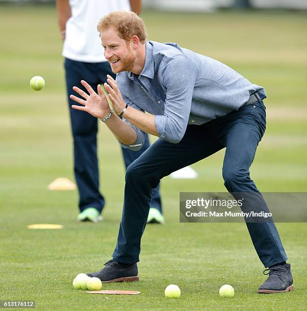 Prince Harry takes part in a training session as he attends an event to mark the expansion of the Coach Core sports coaching apprenticeship programme...