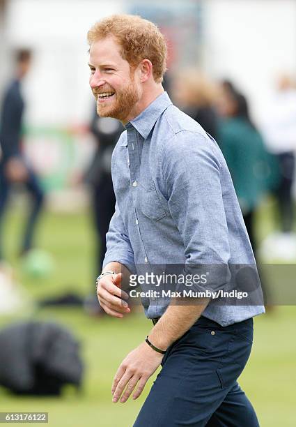 Prince Harry takes part in a training session as he attends an event to mark the expansion of the Coach Core sports coaching apprenticeship programme...