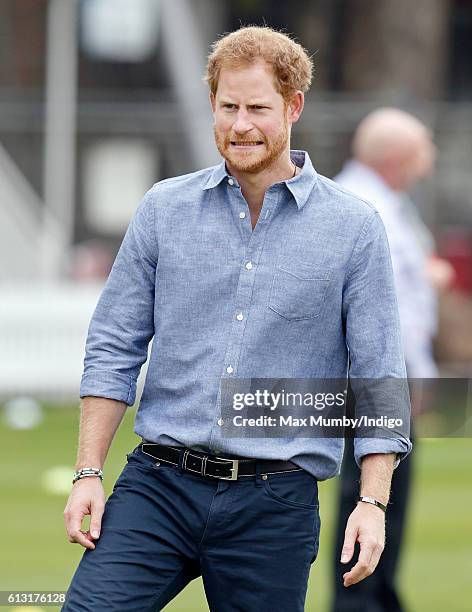 Prince Harry takes part in a training session as he attends an event to mark the expansion of the Coach Core sports coaching apprenticeship programme...