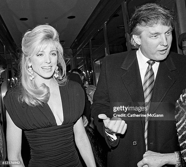 7th: Donald Trump and Marla Maples pose for a photo at comedian Joey Adams' 80th birthday party on January 7, 1991 in New York City, New York. "n