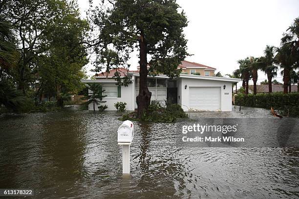 Home is surrounded in Hurricane Matthew's flood waters, October 7, 2016 on Port Orange, Florida. Hurricane Matthew passed the area offshore as a...