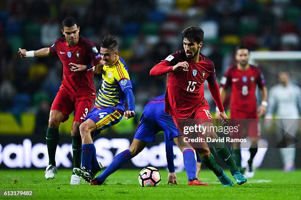 Andre Gomes of Portugal competes for the ball with Marc Vales of Andorra during the FIFA 2018 World Cup Qualifier between Portugal and Andorra at...