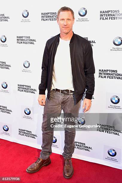 Actor Aaron Eckhart attends the Conversation with Aaron Eckhart during The Hamptons International Film Festival 2016 at Guild Hall on October 7, 2016...