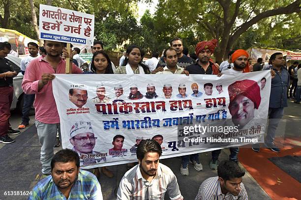 The members of Youth Wing of Aam Aadmi Party protesting against Union Minister for Defence Manohar Parrikar and Central Government for defaming...