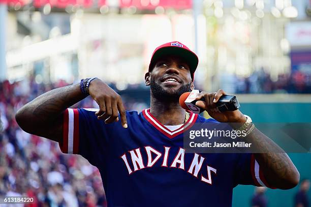 LeBron James of the Cleveland Cavaliers addresses the crowd prior to game two of the American League Divison Series between the Boston Red Sox and...