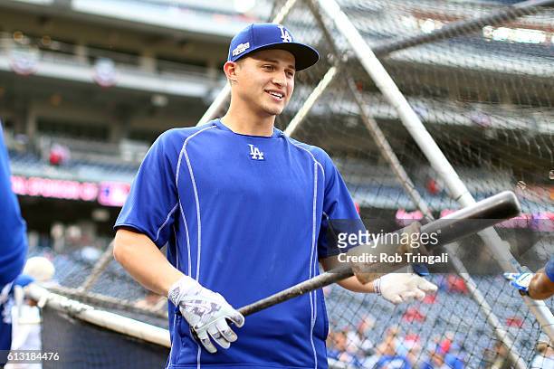 Corey Seager of the Los Angeles Dodgers looks on during batting practice prior to Game 1 of NLDS against the Washington Nationals at Nationals Park...