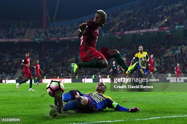 Ricardo Quaresma of Portugal competes for the ball with Ildefons Lima of Andorra during the FIFA 2018 World Cup Qualifier between Portugal and...