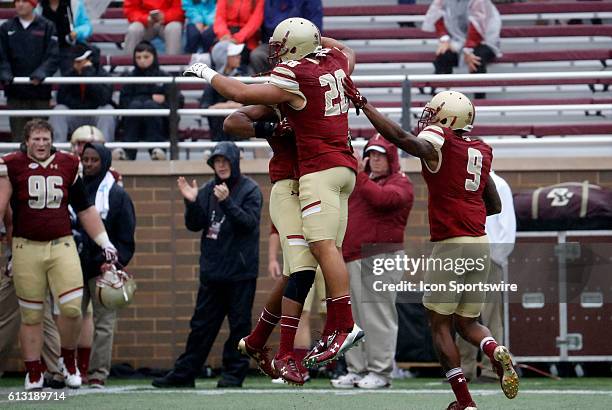 Boston College linebacker Matt Milano and Boston College defensive back John Johnson celebrate a blocked punt. The Boston College Eagles defeated the...