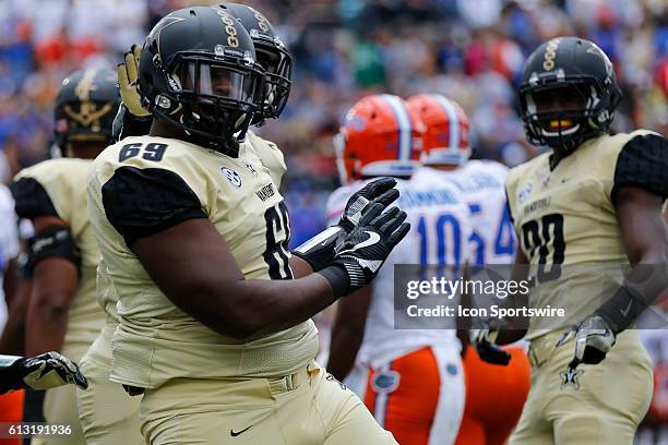 Vanderbilt Commodores defensive tackle Adam Butler celebrates a tackle for loss during a 13-6 win by Florida over Vanderbilt at Vanderbilt Stadium in...