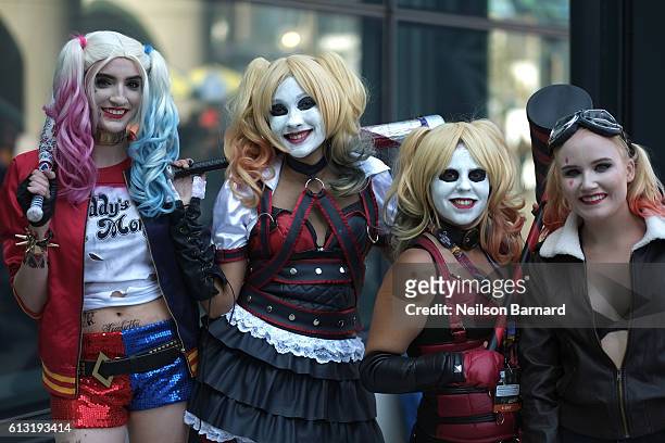 Cosplayer's dressed as Harley Quinn attend the New York Comic Con 2016 at The Jacob K. Javits Convention Center on October 7, 2016 in New York City....
