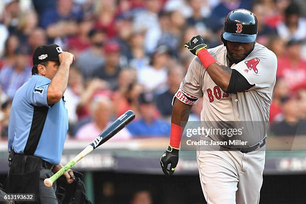 David Ortiz of the Boston Red Sox tosses his bat after flying out in the fourth inning against the Cleveland Indians during game two of the American...