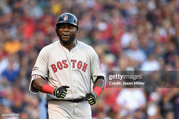 David Ortiz of the Boston Red Sox reacts after flying out in the fourth inning against the Cleveland Indians during game two of the American League...