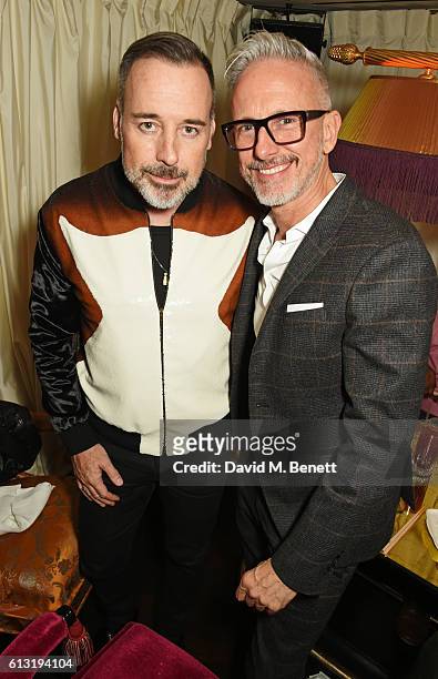 David Furnish and Patrick Cox attend the Moncler "Freeze For Frieze" Dinner Party at the Moncler Bond Street Boutique on October 7, 2016 in London,...