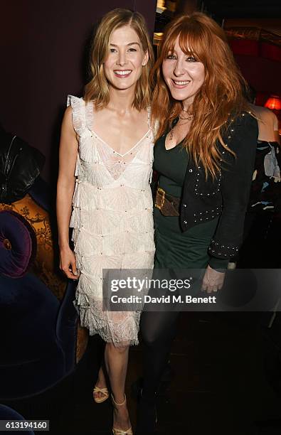 Rosamund Pike and Charlotte Tilbury attend the Moncler "Freeze For Frieze" Dinner Party at the Moncler Bond Street Boutique on October 7, 2016 in...