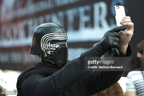 Cosplayer dressed as Kylo Ren attends the New York Comic Con 2016 at The Jacob K. Javits Convention Center on October 7, 2016 in New York City. New...