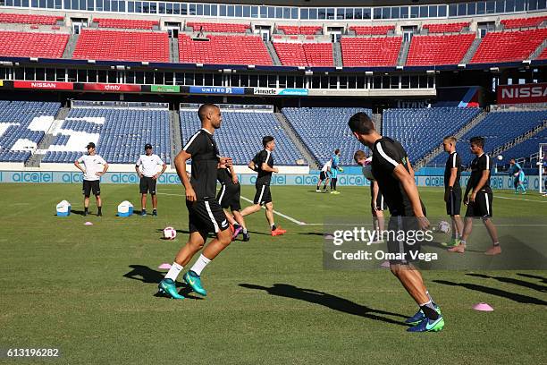 Players of New Zealand warm up during a New Zealand National Team training session at Nissan Stadium on October 07, 2016 in Nashville, Tennesse,...