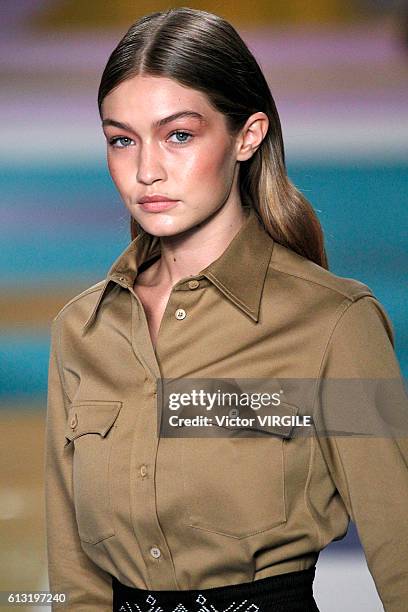 Gigi Hadid walks the runway during the Miu Miu Ready to Wear fashion show as part of the Paris Fashion Week Womenswear Spring/Summer 2017 on October...