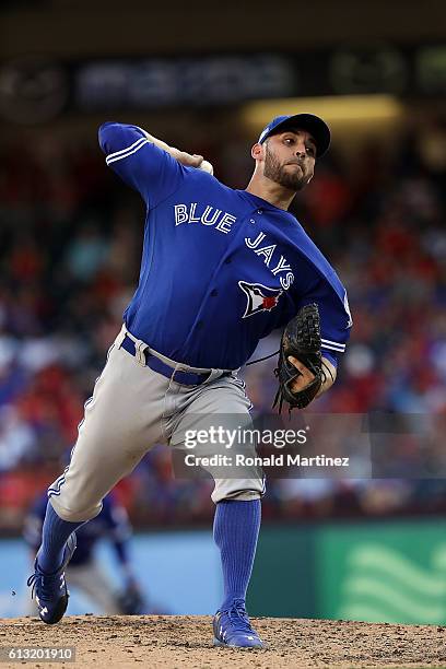 Marco Estrada of the Toronto Blue Jays throws a pitch against the Texas Rangers during the first inning in game one of the American League Divison...